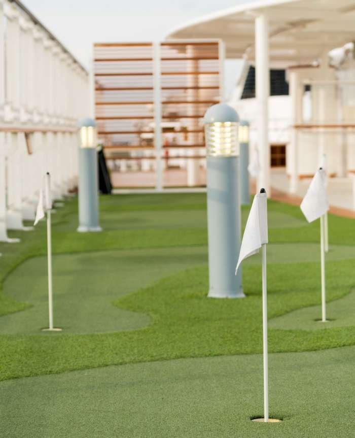 this sand-filled backyard putting green is designed and installed by Tampa Turf Solutions pros